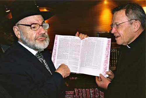 Cardinal Kasper holding the Talmud with rabbi Zevulun